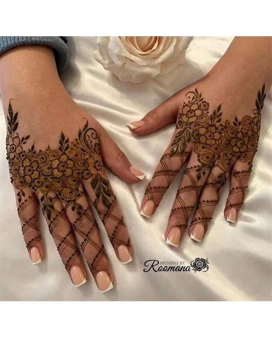 Cultural Blend Using Teardrop Back Hand Mehndi Design